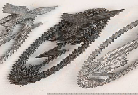 WWII NAZI LUFTWAFFE GROUND ASSAULT FLAK BADGE LOT: Lot of two Luftwaffe Combat Service Awards to include 1) LUFTWAFFE FLAK ARTILLERY WAR BADGE BY FERDINAND WIEDMANN. A Luftwaffe &#8220;Flak Abzeichen&#8221;: an oval silvered zink oak leaf wreath consi