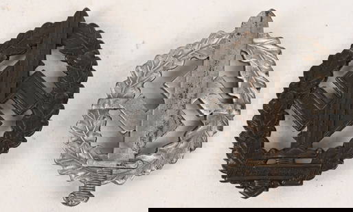 WWII NAZI GERMAN SA SPORTS BADGE LOT WAR WOUNDED: Lot of two Nazi German Badges to include 1) SA MILITARY SPORTS BADGE FOR WAR WOUNDED. Die struck, solid backed, alloy award with a bronze wash. Badge is in the form of a slightly vertical, oval oak-le