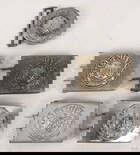 WWII NAZI GERMAN BELT BUCKLE LOT OFFICER ENLISTED: Lot of WWII Nazi German Belt buckles to include 1) ARMY OFFICERS BELT BUCKLE. Two piece die stamped aluminum construction, circular belt buckle. The buckle features a highly embossed oak-leaf wreath e