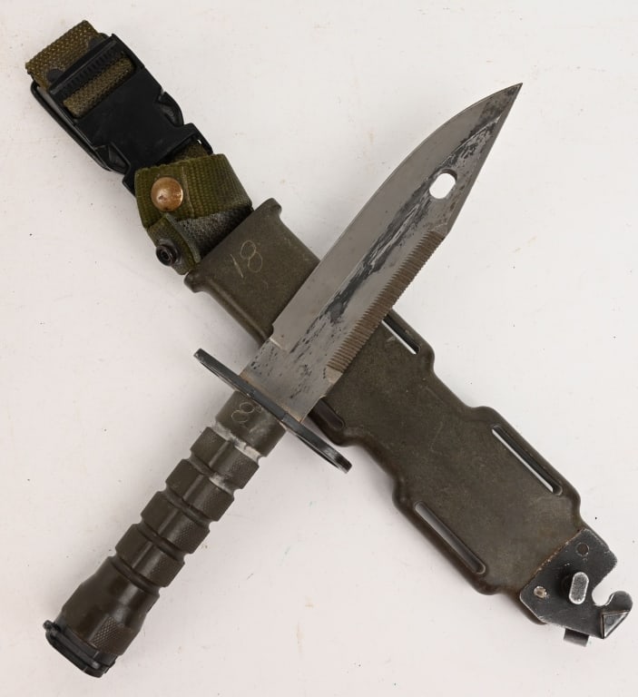 U.S. MODEL M9 BAYONET & SCABBARD LANCAY: The M9 Bayonet is a multi-purpose knife and bayonet officially adopted in 1986 by the United States. Made by LanCay. 12" overall with 7" blade. Includes original scabbard complete with integral sharpe