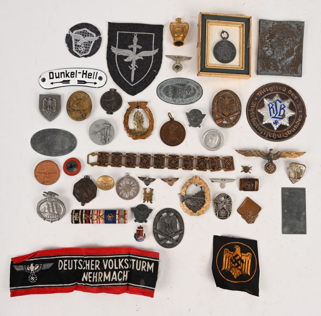 WWII NAZI GERMAN INSIGNIA BADGE LOT HEER KRIEGS: WWII Nazi German lot of militaria to include RLB Door Plate, Kriegsmarine Summer Officer's Breast Eagle, General Assault Badge (missing pin and catch assembly), General Assault Badge (missing pin and 