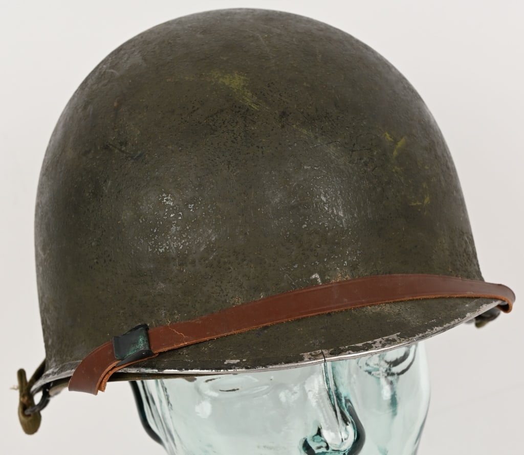WWII US ARMY M1 COMBAT HELMET W CAPAC LINER WW2: WWII Front Seam Swivel Bale Helmet with Capac Liner. The liner has equal amount of wear as the lid and is in very good condition overall with minor wear to the straps.The M1 is two "one-size-fits-all"