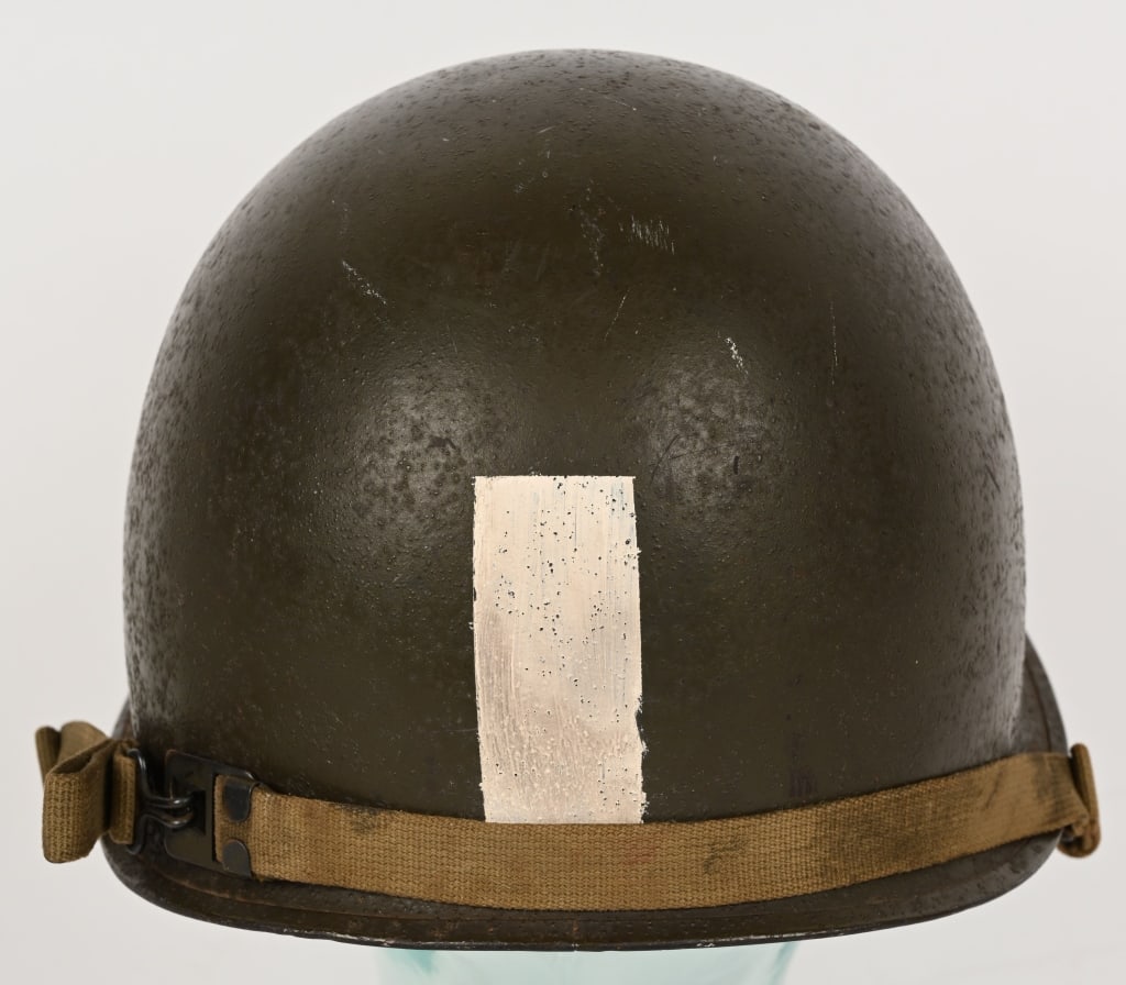 WWII NAMED M1 OFFICERS SWIVEL BALE COMBAT HELMET: WWII rear Seam Swivel Bale Helmet with Westinghouse Liner. The liner has equal amount of wear as the lid and is in very good condition overall with minor wear to the straps.Named to both liner and she