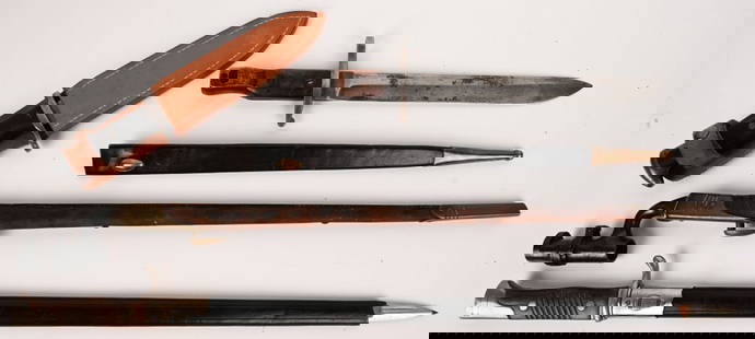 EDGED WEAPON LOT FIGHTING KNIFE BAYONETS: Lot of edged weapons to include 1) 19th Century British military Martini Henry Enfield rifle bayonet. Socket style with 22" blades, scabbard is in excellent condition, British proof marks with minor a