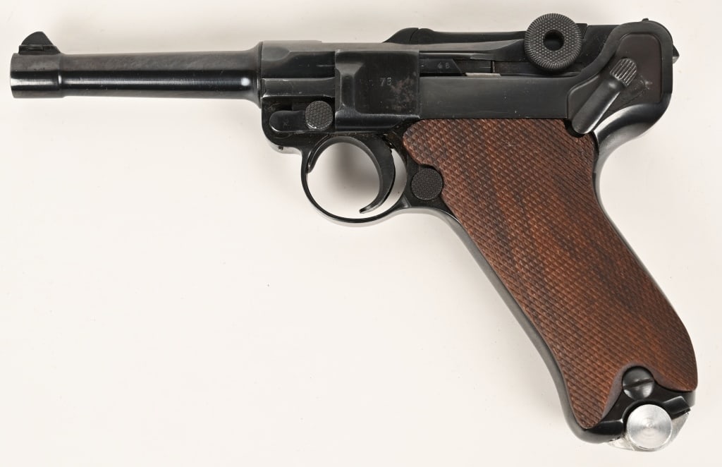 NICE RESTORED P08 LUGER IN 9MM SEMI AUTO PISTOL: SERIAL NUMBER: 2519 BARREL: 3 7/8" CALIBER: 9MM MANUFACTURED: 1900's This Luger is non-matching parts with new replacement grips, and mag. There is what appears to be Farsi script above the serial num