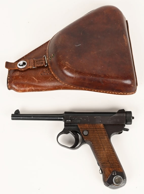 WW2 JAPANESE TYPE 14 NAMBU PISTOL WITH HOLSTER: SERIAL NUMBER 58704 BARREL 4-5/8" CALIBER 8MM NAMBU MANUFACTURED 1944. Produced at Kokubunji Factory Tokyo Japan with blue finish, Oil finished grooved wood grip panels and 2 groove knurled cocking kn