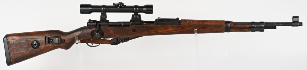 GERMAN K 98 SNIPER RIFLE RE-PRODUCTION 8MM: SERIAL NUMBER: 4030 BARREL: 24" CALIBER: 8MM MANUFACTURED: 1939-1945 Despite the experiences of World War I, prior to the outbreak of World War II the German military command believed sniper rifles wi
