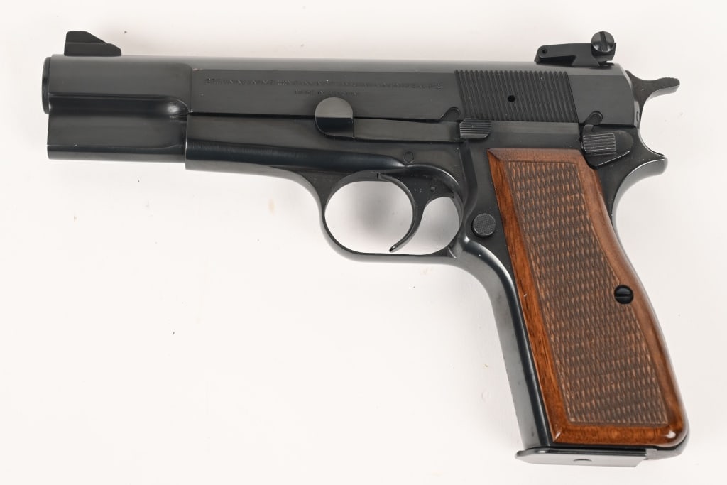 BELGIUM BROWNING HI-POWER PISTOL 9MM: SERIAL NUMBER: 245RN13024. BARREL: 4 ¾". CALIBER: 9MM. MANUFACTURED: 1979. The Browning Hi-Power, made in Belgium, is a single-action semi automatic pistol. It features a blued finish, checkered 