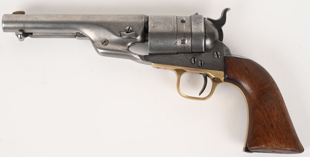 1860 COLT ARMY CONVERSION REVOLVER: SERIAL NUMBER: 191879. BARREL: 5-1/2" CALIBER .44 COLT. MANUFACTURED: 1870. Finished blue with case hardened frame. One-piece walnut grips. Richards style conversion to .44 Colt. CONDITION: Clean over