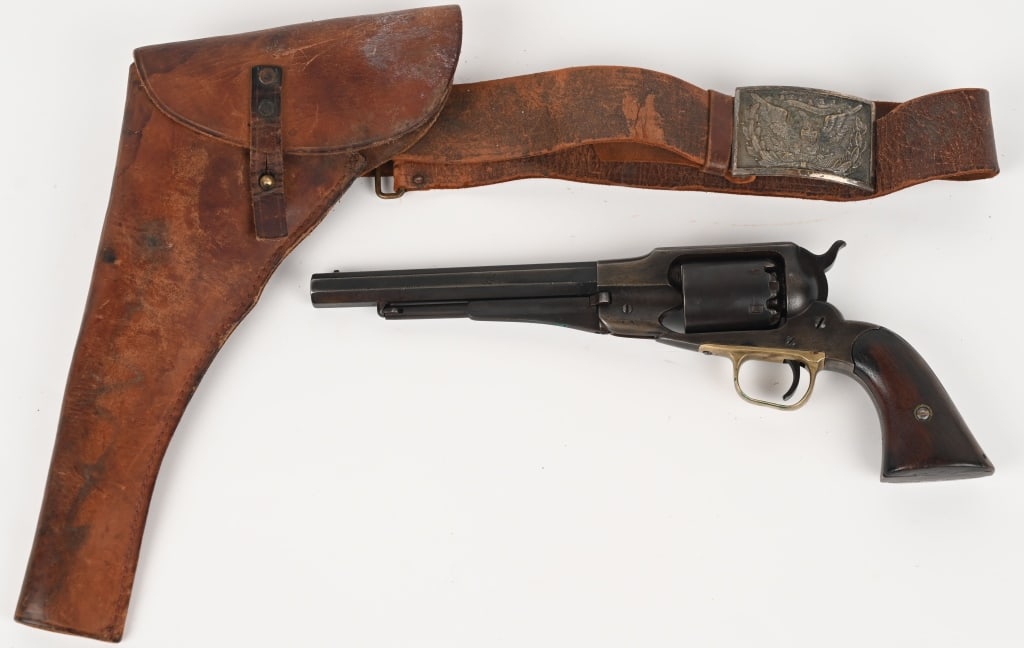 REMINGTON 1861 NAVY REVOLVER WITH HOLSTER: SERIAL NUMBER 22850. BARREL 7.5". CALIBER .36 MADE 1862. Standard features include full octagon barrel, pinch front sight, brass trigger guard, two piece walnut grips, six shot single action. Comes wi