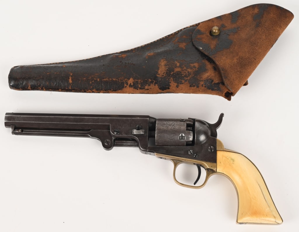 COLT MODEL 1849 REVOLVER: SERIAL NUMBER: 166144. BARREL: 6". CALIBER: .36 PERCUSSION. MANUFACTURED:1859. Revolver is finished blue with case hardened frame & lever. One-piece Ivory grips. Brass trigger guard and backstrap. Inc
