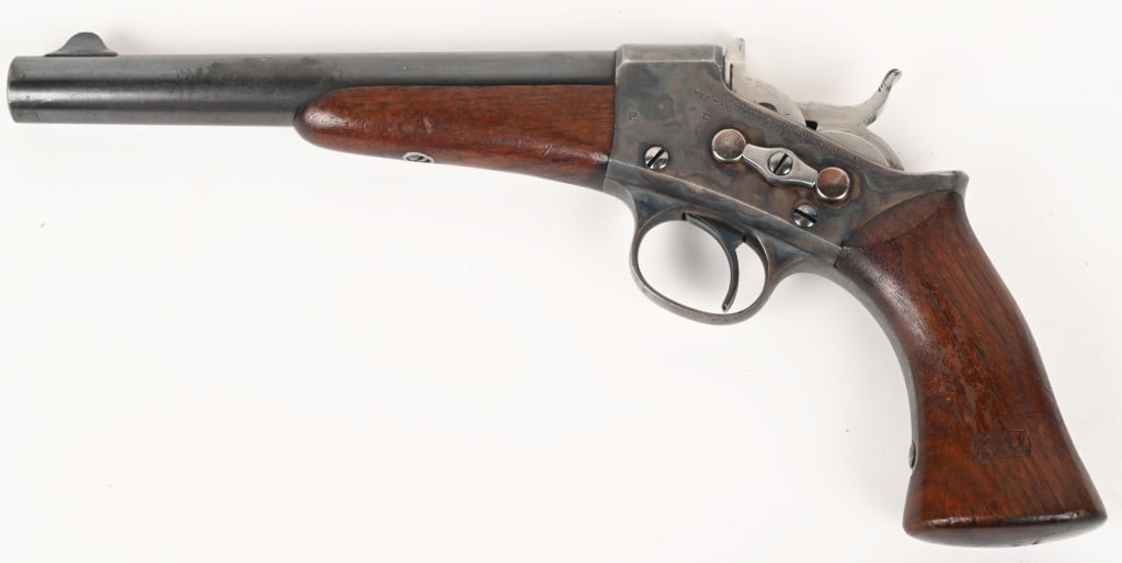 FINE REMINGTON 1871 ARMY ROLLING BLOCK PISTOL: SERIAL NUMBER: NSN. BARREL: 8". CALIBER: 50 REMINGTON CENTERFIRE. MANUFACTURED: 1871-88. One of 6000 contracted to the United States Army in 1871. 2 piece oil finished walnut stocks with "P" proof on