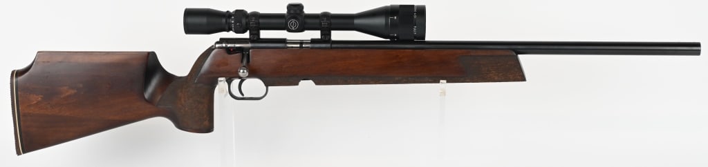 ANSCHUTZ MODEL 54 MS BOLT ACTION RIFLE W/SCOPE: SERIAL NUMBER: 1162823. BARREL: 22 1/8". CALIBER: .22LR. MANUFACTURED: 1979. German proofs on the receiver, bolt and barrel. Barrel is marked "Cal.22long rifle". Left side of the receiver marked "J.G.