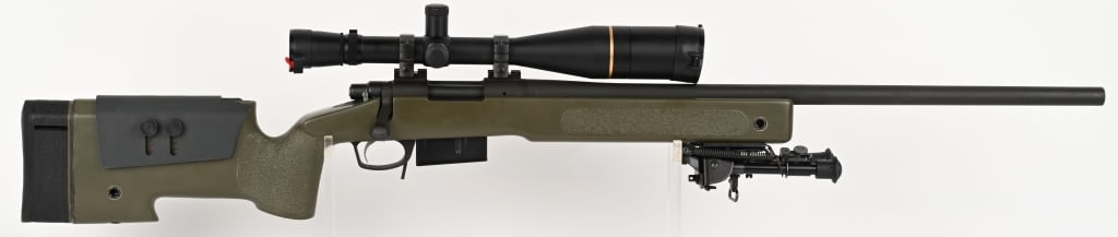 REMINGTON 700 WITH SNIPER STOCK, SCOPE & MOR: SERIAL NUMBER: E6665471. BARREL: 26". CALIBER: .308 WIN. This Remington build showcases a A4 McMillan stock (used in M40 USMC system) that houses the reliable Remington 700 action. The olive finished