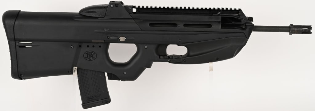 FS2000 5.56x45MM NATO SEMI AUTOMATIC BULLPUP: SERIAL NUMBER: 052251. BARREL: 16". CALIBER: 5.56X45MM. FN Herstal Belgium Model FS2000 is a semi-automatic carbine, a civilian version of the F2000 bullpup rifle, chambered in 5.56mm NATO. It feature