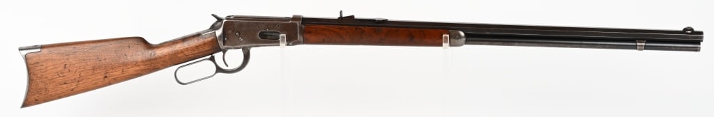WINCHESTER MODEL 1894 RIFLE: SERIAL NUMBER: 280400. BARREL: 26". CALIBER: ,30 WCF. MANUFACTURED:1902. Rifle is finished blue with case hardened lever & hammer. Octagon barrel & full length magazine tube. Plain walnut stock and fo