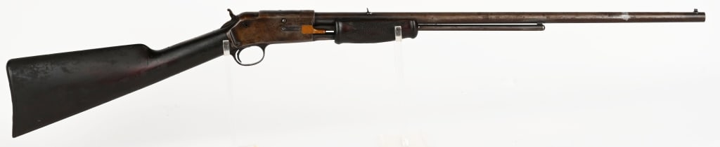 SMALL FRAME COLT LIGHTNING RIFLE: SERIAL NUMBER: 14912 BARREL: 24" CALIBER: .22RF MANUFACTURED: 1892. Finished blue. Plain walnut stock and forearm. Composite shotgun style buttplate. Round barrel. CONDITION: Fair, mostly patina. Wood