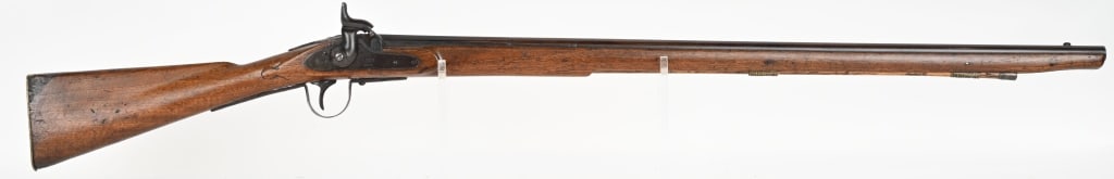 BARNET LONDON PERCUSSION TRADE RIFLE: SERIAL NUMBER: N/A, BARREL: 36", CALIBER: about .60, Lock is marked Barnett London 1884. Octagon / round barrel with proofs at the breech. Has brass serpant side plate, 5 screw butt plate and iron tri