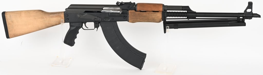 CENTURY INTERNATIONAL ARMS MODEL M72 7.62X39: SERIAL NUMBER: M7202033 BARREL: 22" CALIBER: 7.62 X 39 MM MANUFACTURED: 2000s. Parkerized heavy barrel with integral bipod and cleaning rod mounted below barrel, standard cut away AK47 style flash hid
