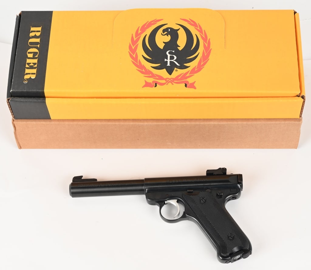 RUGER MARK II TARGET SEMI AUTOMATIC PISTOL 22 LR.: SERIAL NUMBER: 215-14823. BARREL: 5 ½". CALIBER: .22 LR. MANUFACTURED: 1989. This blowback operated pistol features blued steel finish, polymer checked grips with Ruger emblem, silver tone target