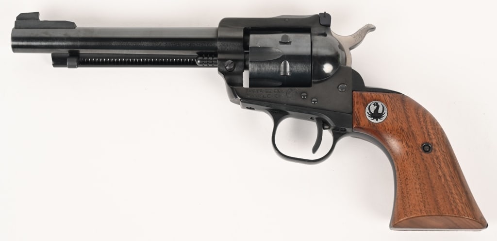 RUGER MODEL SINGLE SIX .22 LR REVOLVER: SERIAL NUMBER: 508221. BARREL: 5 ½". CALIBER: .22 LR. MANUFACTURED: 1960s. The Single Six is a single-action revolver chambered in 22 LR. It features 3 screw design, blued finish, smooth wood gri