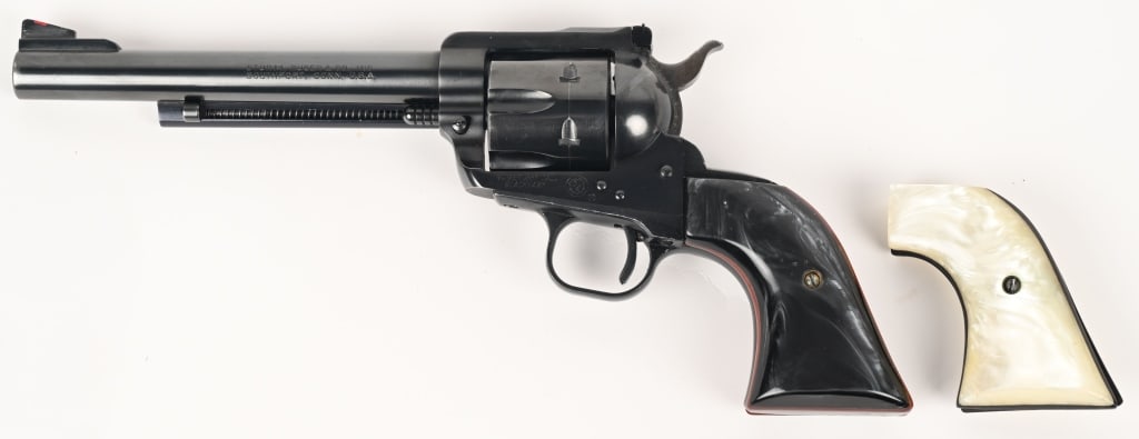 RUGER BLACKHAWK 357 MAGNUM REVOLVER: SERIAL NUMBER: 107303 BARREL: 6 1/2" CALIBER: 357 MAGNUM MANUFACTURED: 1967-1968 3-screw gun converted. Standard markings and features. Six shot fluted cylinder. Factory blade front sight and adjustab