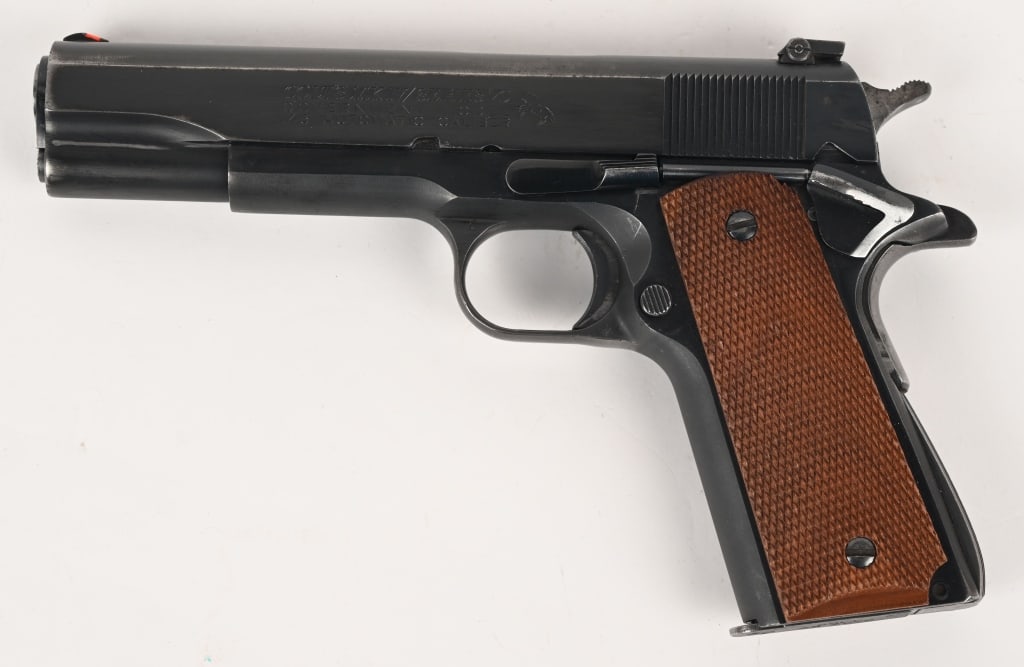 COLT MK IV SERIES 70 GOVERNMENT .45 CAL PISTOL: SERIAL NUMBER: 70B10053. BARREL: 5". CALIBER: .45 ACP. MANUFACTURED: 1981. This Colt 1911 features a blued finish, checkered walnut grips, fixed front sight with red insert, MMC u-notch white outlined