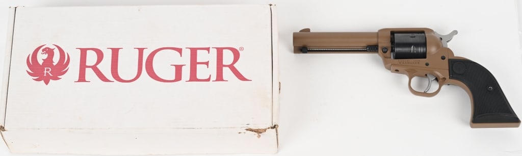 RUGER WRANGLER .22LR SINGLE ACTION REVOLVER: SERIAL NUMBER: 204-46763. BARREL: 4 ½". CALIBER: .22 LR. MANUFACTURED: 2021. . Six shot, non-fluted cylinder. Blade front sight and u-notch rear. Factory burnt bronze Cerakote finish and checkere
