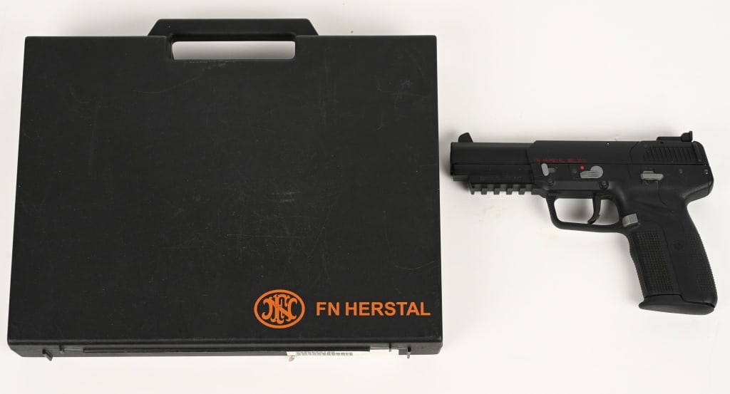 FN FIVE SEVEN MKI SEMI AUTOMATIC PISTOL: SERIAL NUMBER: 386181186. BARREL: 5". CALIBER: 5.7X28MM. The FN Five Seven features a matte black polymer frame with checkered grip, matte black steel slide, ambidextrous safety lever, 3-dot sight con