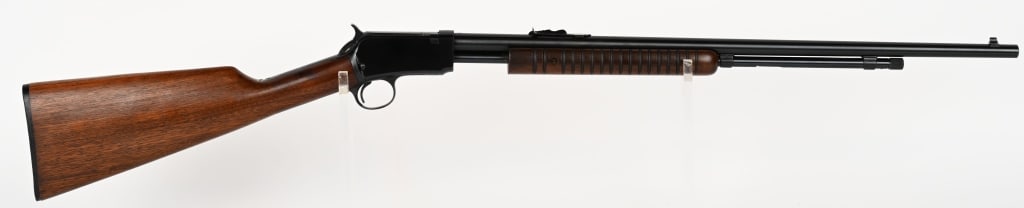WINCHESTER MODEL 62A MINTY SLIDE ACTION 22 RIFLE: SERIAL NUMBER: 332538. BARREL: 23". CALIBER: .22 S-L-LR. MANUFACTURED: 1954. Features round barrel, tube magazine, sporting sights, take down, blue finish, walnut stock and forend, Winchester butt pla