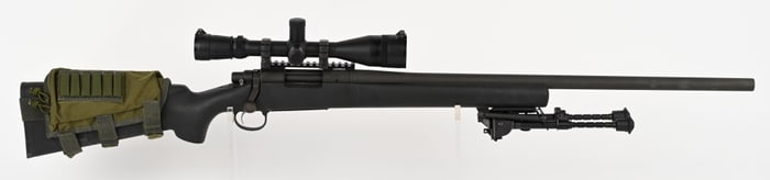 REMINGTON 700 .223 BOLT ACTION RIFLE W/ LEUPOLD