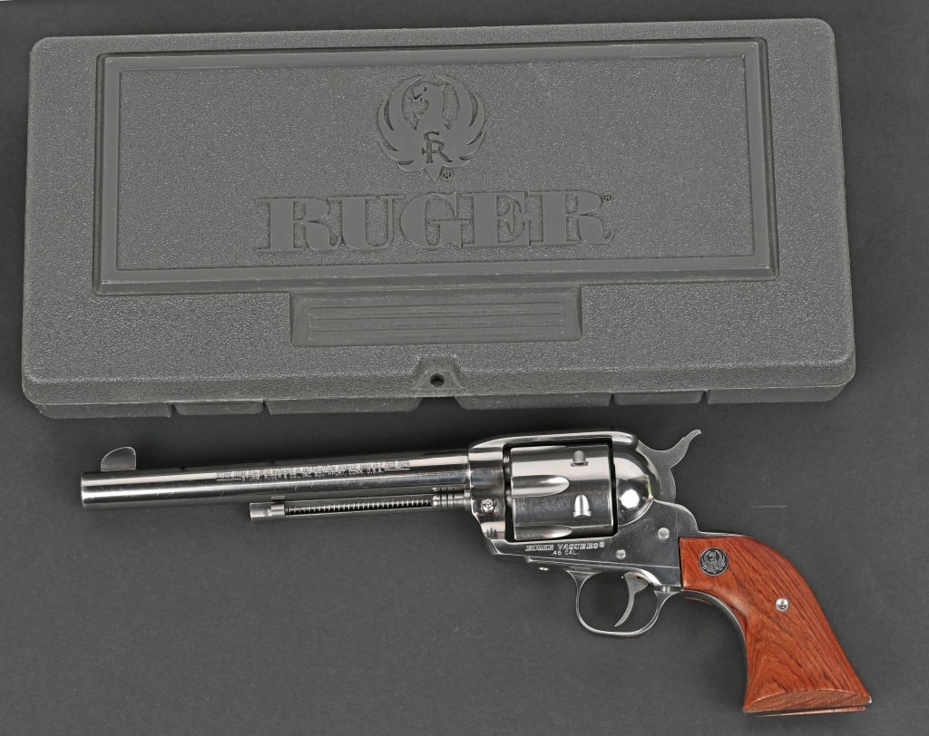 RUGER HIGH GLOSS VAQUERO REVOLVER W/CASE: SERIAL NUMBER: 61-61758. BARREL: 7 ½". CALIBER: 45 COLT. MANUFACTURED: 2000. The Ruger Vaquero is a single action revolver known for its classic Old West appearance and rugged reliability. It's b