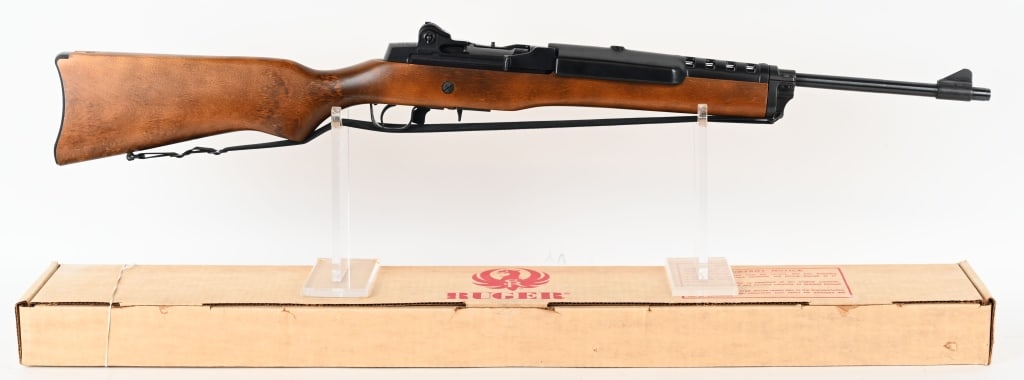 RUGER MINI-14 SEMI AUTO RIFLE .223 WITH BOX: SERIAL NUMBER: 183-22690. BARREL: 18 ½". CALIBER: .223 REM. MANUFACTURED: 1982. The Mini-14 is a lightweight semi-automatic rifle similar to the M14 rifle and is, in appearance, a scaled-down ver