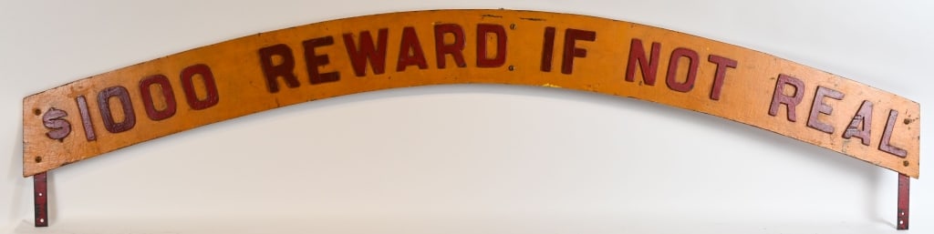 $1000 REWARD IF NOT REAL WOODEN SIDE SHOW SIGN: Early $1000 Rewiard If Not Real wooden Side Show Sign. All original sign from a Carnical Side Show. Has nice colors. Wood with metal for attaching the sign. A very cool piece. 72" Excellent