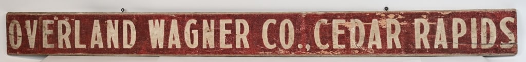 OVERLAND WAGNER CO CEDAR RAPIDS WOOD SIGN: Overland Wagner Co Cedar Rapids smaltz 1900s sign and painted wood sign. All original condition. Has some normal wear from the elements. 84"x71/2" Very Good-Excellent