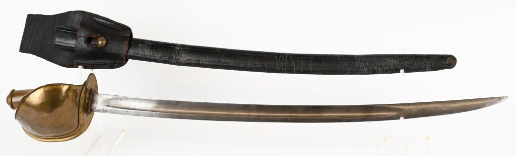 CIVIL WAR US NAVY CUTLASS M1860 DR INSPECTED 1862: Civil War U.S. Navy cutlass with original scabbard. This US MODEL 1860 cutlass is in very good condition with leather covered wooden grip, large brass guard and is complete with original leather scabb