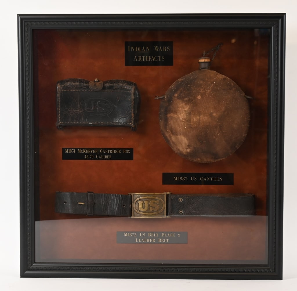 INDIAN WARS BELT & BUCKLE CANTEEN MCKEEVER BOX: Framed Indian Wars lot to include 1) US INDIAN WARS US BELT AND BUCKLE. Indian War US Army Cavalry Pattern 1872 Leather Belt wIth US Brass Plate. Very Good. 2) INDIAN WAR CANTEEN. Indian War to Span A