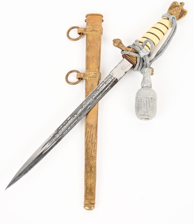 WWII NAZI GERMAN KRIEGSMARINE DAGGER BY WKC WW2: Roughly 25cm long, drop forged steel, nickel/silver plated, stiletto style blade with dual, narrow, central fullers. Blade features the standard acid etched design of fouled anchors and ornate foliage