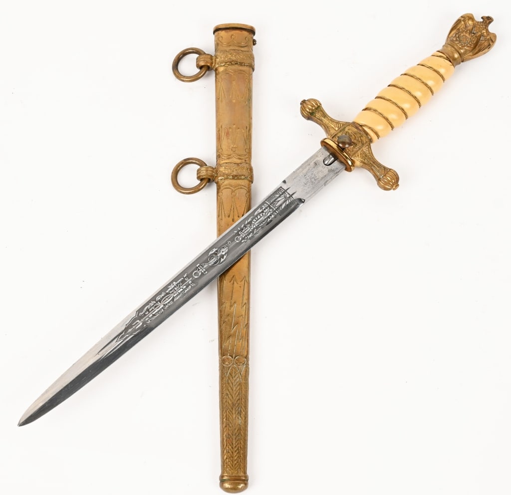 WWII NAZI GERMAN KRIEGSMARINE OFFICER'S DAGGER WW2: Roughly 25cm long, drop forged steel, nickel/silver plated, stiletto style blade with dual, narrow, central fullers. Blade features the standard acid etched design of fouled anchors and ornate foliage