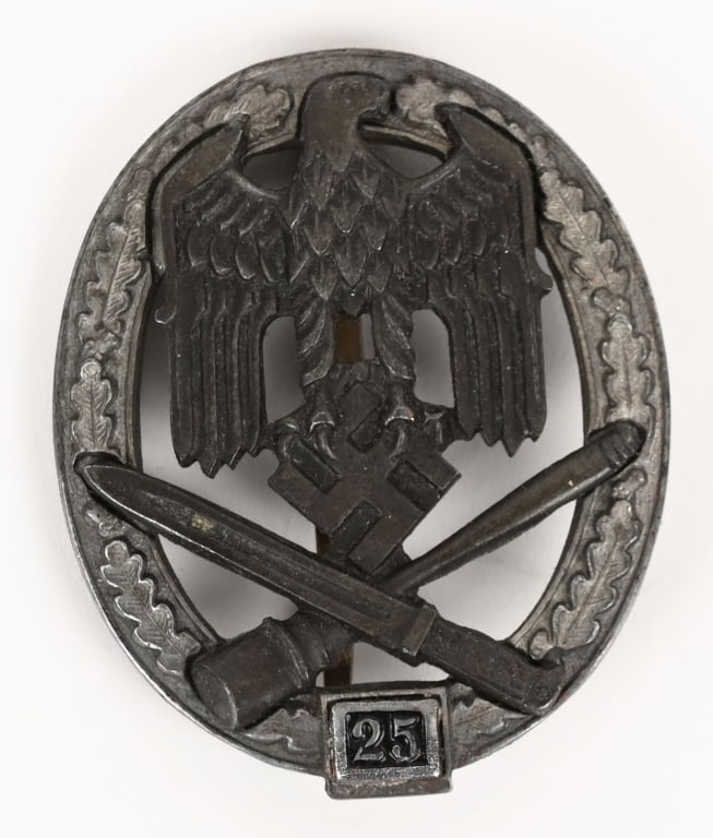 WWII NAZI GERMAN 25 GENERAL ASSAULT BADGE BY RK: Large, two piece, highly convexed, die struck zinc alloy construction badge with a burnished blued wash and a nickel/silver plated finish features a vertically oval, embossed, oak-leaf wreath encompas