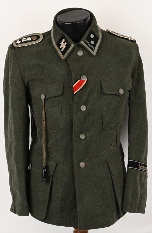 WWII NAZI GERMAN WAFFEN SS GERMANIA UNIFORM WW2: Field-gray wool/rayon blend construction M40 pattern field blouse with a lay down, cloth collar, features a vertical, five button front closure with a single hook and eye positioned at the forward nec