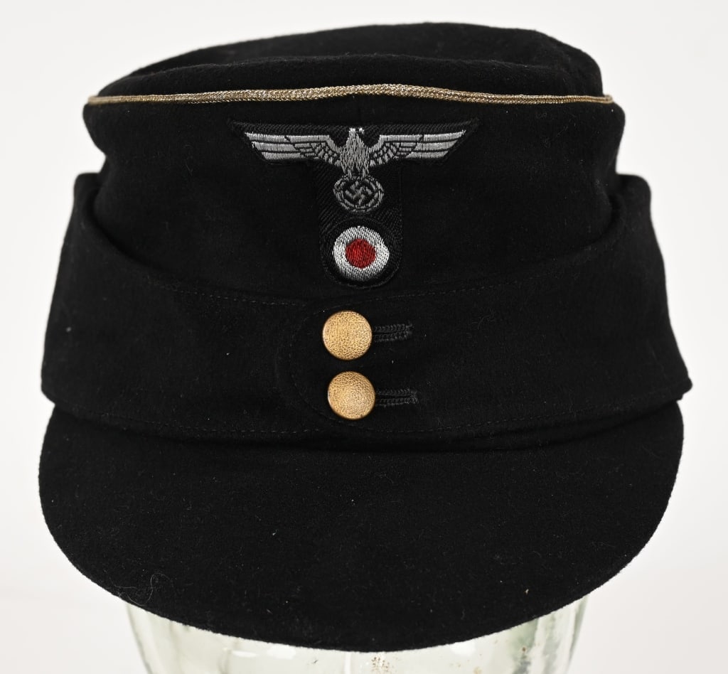 WWII NAZI GERMAN GENERALS PANZER M43 CAP WW2: Nice quality black wool construction cap features fold down back and side panels with a downward scalloped front edge and forward sides and two small gilded pebbled metal buttons. The back and si