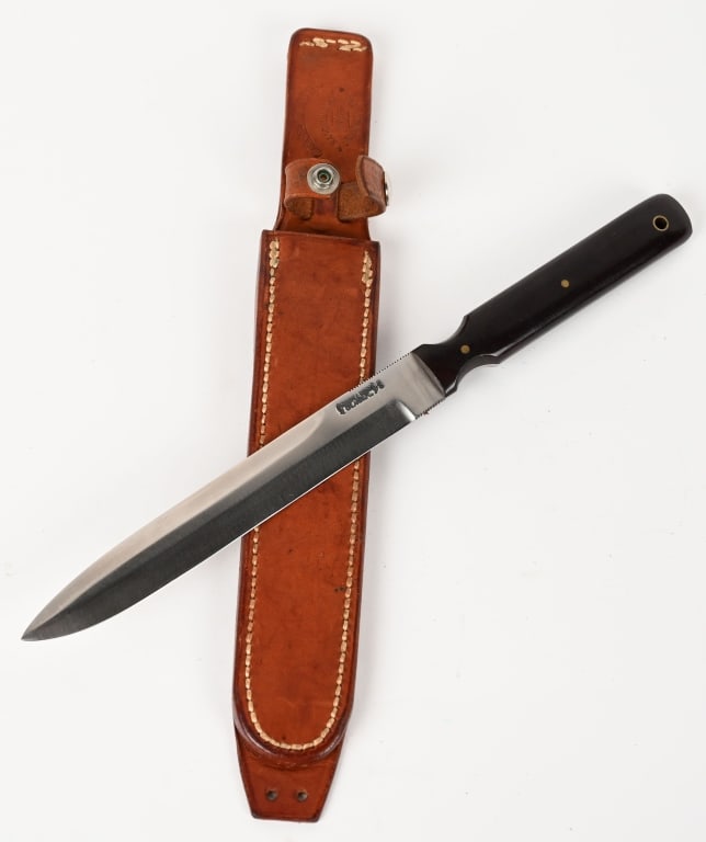 RANDALL MODEL 10 JACK CRIDER FIGHTING KNIFE: Randall Made Jack Crider Special Model 10 - 5 knife. Spear point, bright, double edge blade with double thumb notches. Maker marked "Randall Made Orlando, FLA. S." Full tang construction, wood grips, 