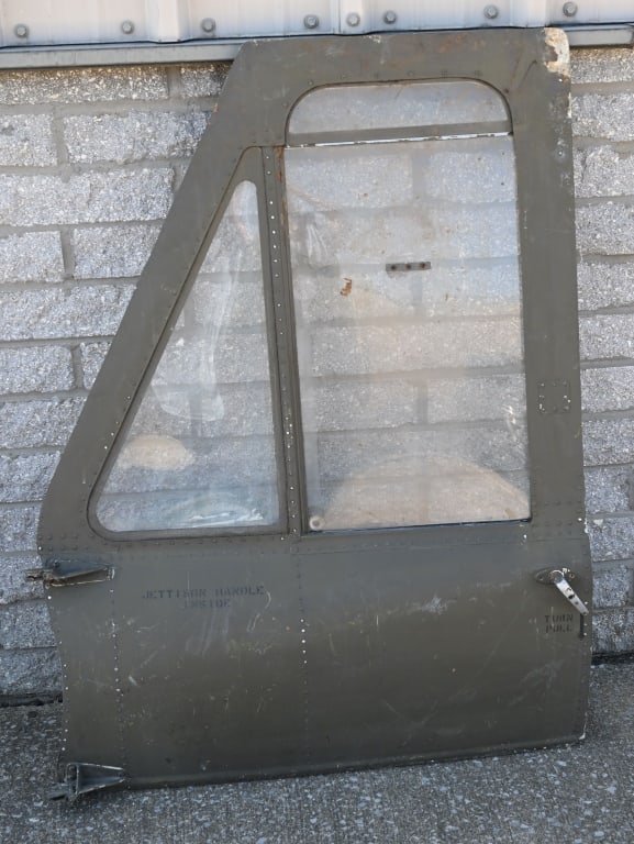 VIETNAM WAR BELL UH-1 HUEY LEFT SIDE FRONT DOOR: The is the left side front door from a Vietnam War U.S. Army Bell UH-1 Iroquois Helicopter aka HUEY. The door is constructed of Aluminum and is in excellent condition and features original paint and m