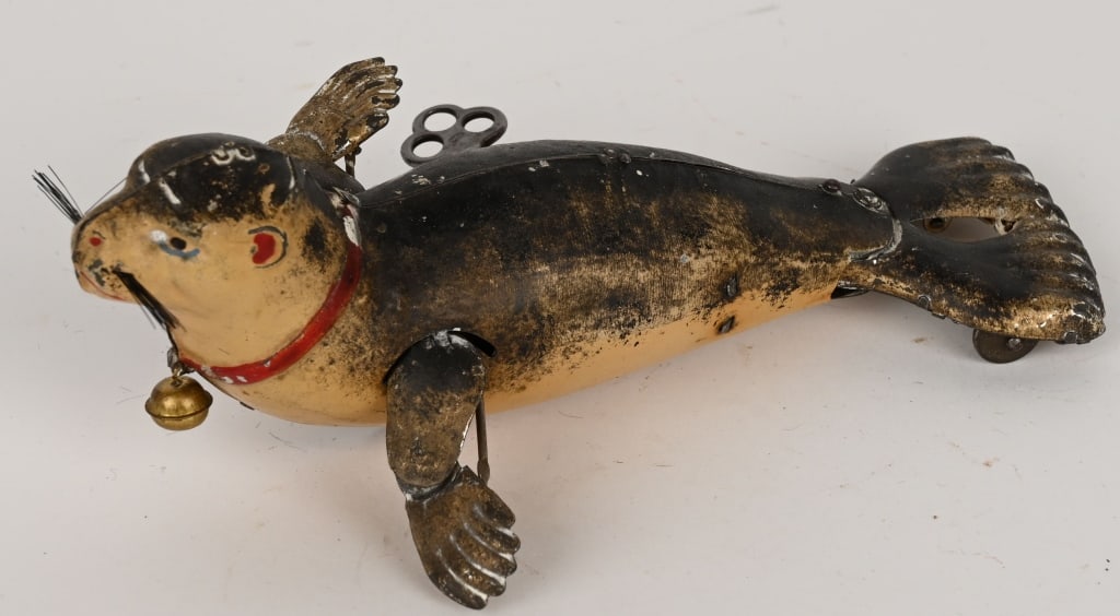 LEHMANN TIN WINDUP SEAL: All original and complete with bell. Windup works. 7" Excellent