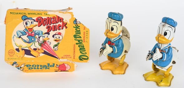2- LINEMAR TIN WINDUP DONALD DUCK WHIRL TAIL TOYS