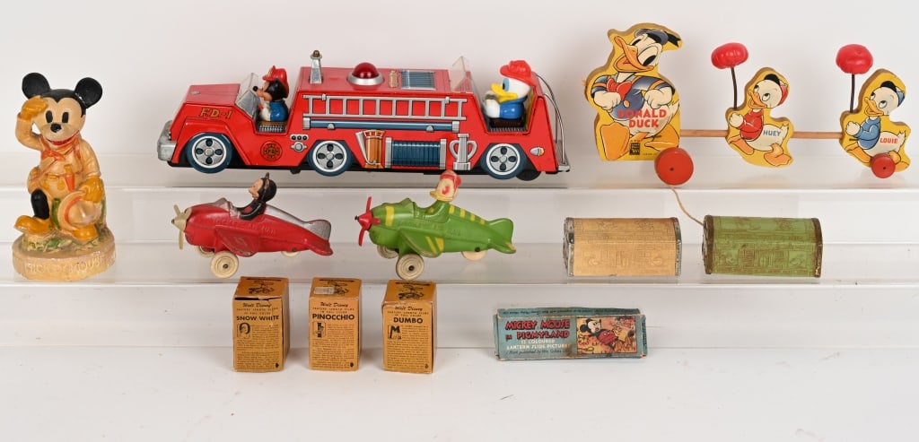 LOT OF VINTAGE DISNEY TOYS: Includes Fisher Price Donald Duck with Nephews, Mickey Mouse Boy Scout, Treasure Chest banks, Sun Rubber Airplanes, and More. Conditions Vary. AS-IS