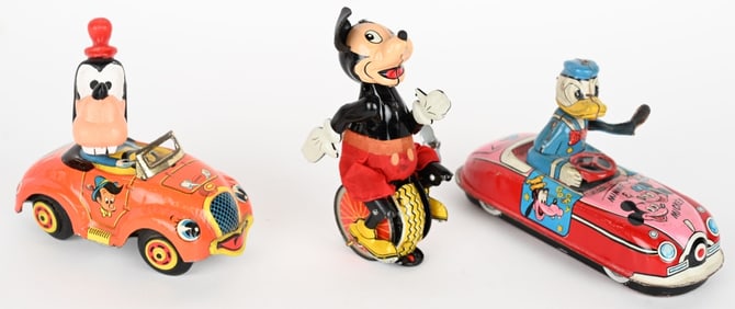 3- DISNET TIN WINDUP TOYS