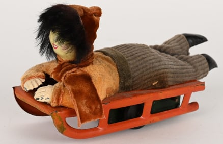 JAPAN TIN WINDUP ESKIMO BOY ON SLED
