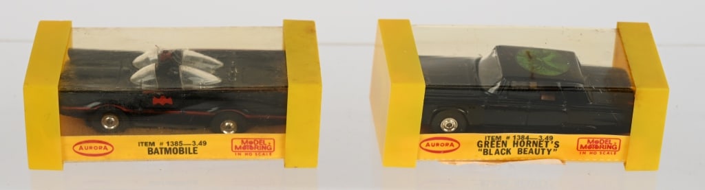 AURORA BATMOBILE & GREEN HORNET SLOT CARS w/ BOX: Lot includes No. 1385 Batmobile and No. 1384 Green Hornet's Black Beauty both with the original boxes. Old store stock with the original .99 cent price tags. Not tested. Excellent